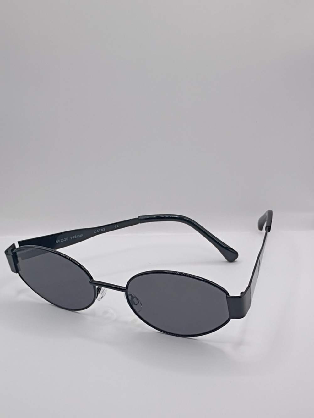 Black Oval Women's Sunglasses - Sleek Black Metal Frame